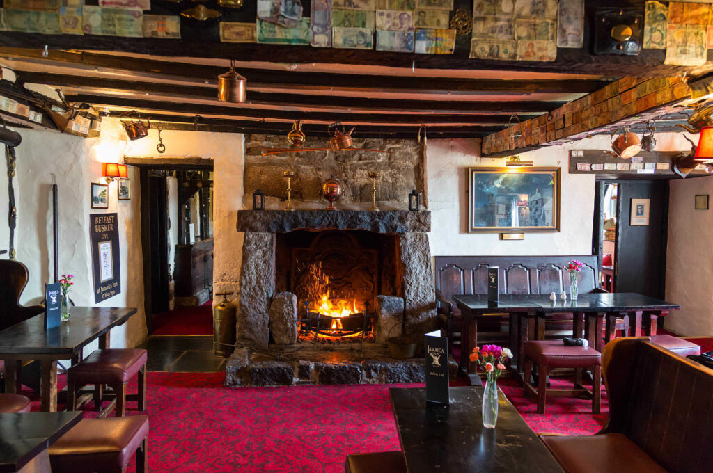 Open fire burning inside the Jamaica Inn pub on Bodmin Moor, Cornwall.