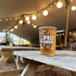 Freshly poured pint of PIG BEER craft lager in the New Forest tap room Brockenhurst Hampshire