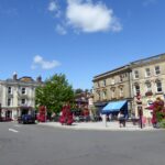 Wimborne Minster town square with surrounding pubs in Dorset