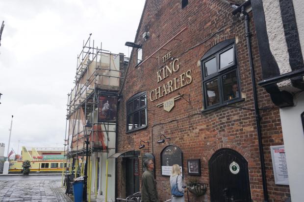 Front view of King Charles Inn in Poole, Dorset, a historic pub associated with reports of ghostly footsteps and unexplained voices