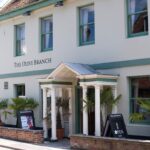 Front of The Olive Branch pub in Wimborne, Dorset, a modern British pub and restaurant in the town centre