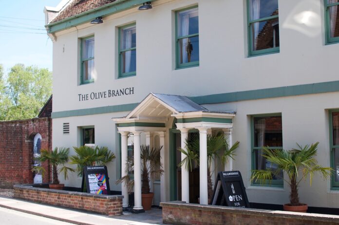 Front of The Olive Branch pub in Wimborne, Dorset, a modern British pub and restaurant in the town centre