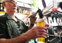 British Pubs Closing At Nearly Two Per Day Across Britain In 2026 “British pub landlord serving beer as pub closures rise across the UK in 2026”