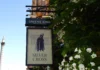 Silver Cross, London: The Historic Westminster Pub with a Royal Secret Silver Cross pub sign on Whitehall in London featuring King Charles II and a King Charles Spaniel outside the historic Westminster pub.